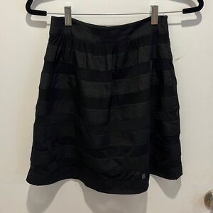BEBE black strip mini skirt